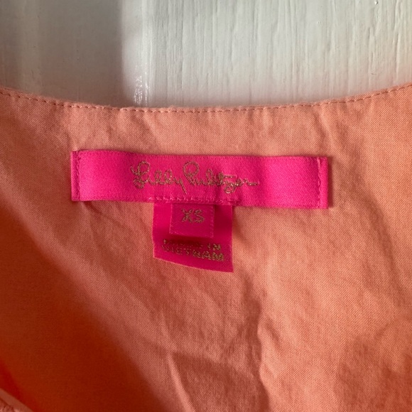 LILLY PULITZER Orange Eyelet “Astara” Ruffle Pom Pom Sleeve Blouse - Picture 5 of 10